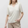 Biała bluzka polo z wełny merynosowej